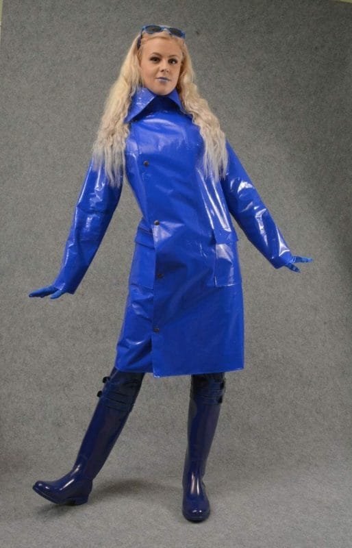 Blonde in blue raincoat and wellies